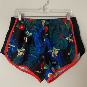 Nike running shorts with tropical pattern